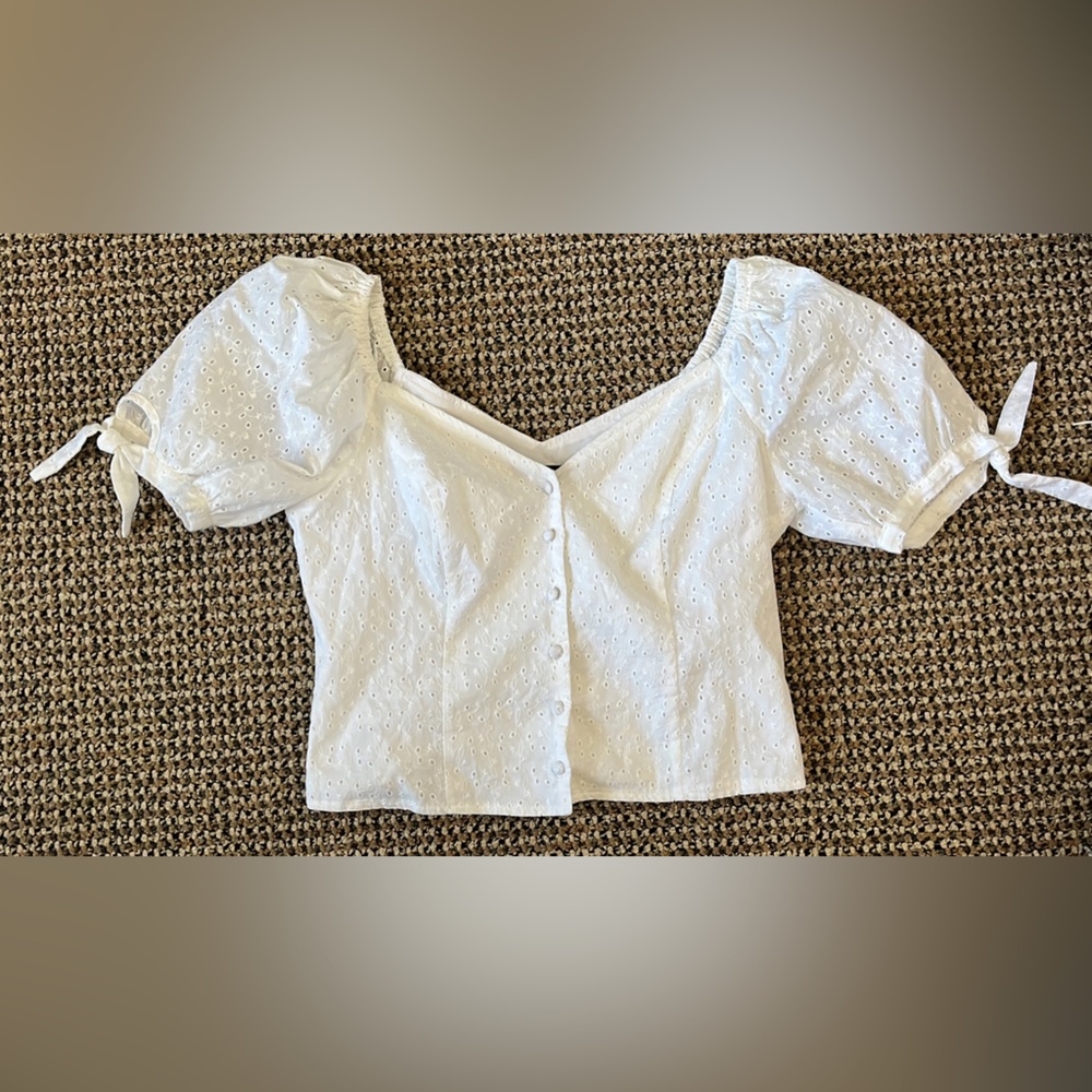 Two blouses, white from express, light green from forever 21